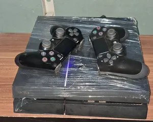 Ps4 Fat Console With Two Pad and Games Install Inside