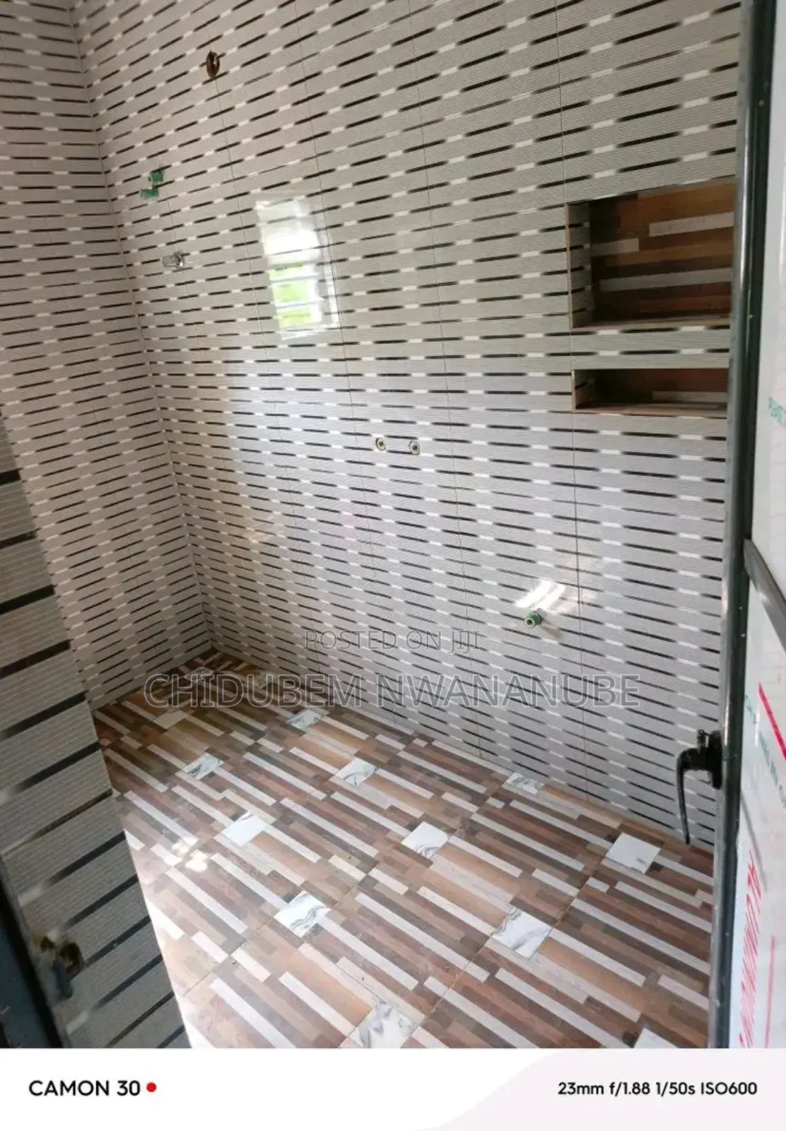 Wall Tile Installation. My People Guess the Size