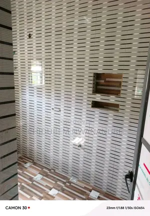 Wall Tile Installation. My People Guess the Size