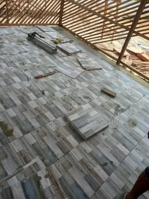 Wall Tile Installation. My People Guess the Size