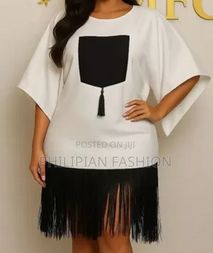 White Gown With Fringe