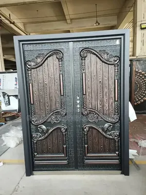 Double Entrance Security Door With a Copper Cast Intricate Carvings