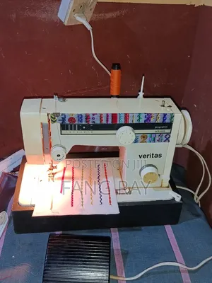 Electric and Manual Sewing Machine