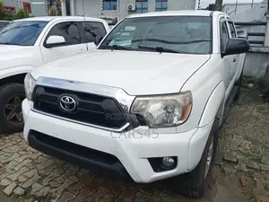 Toyota Tacoma Access Cab 4x4 2.7L 4-Cyl. 5-Speed Manual 2013 White
