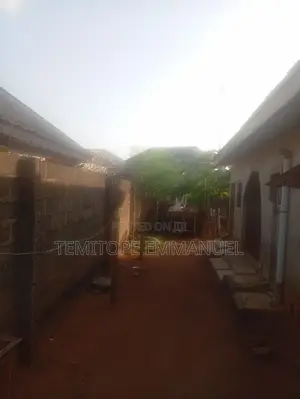 Half Plot of Land Fenced on a Major Road
