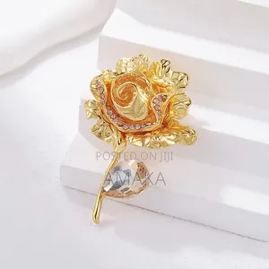 Studded Floral Brooch With Big Gold Stone