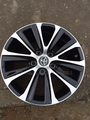 16 Inch Rim Black and Stainless Toyota Camry