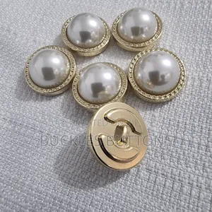 White and Gold Metal Button