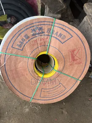 4-Inch by 100-Meter Roll of Lion Brand PVC Flat Hose.