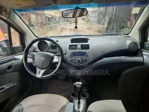 Chevrolet Spark 2011 Maroon