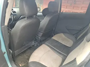 Chevrolet Spark 2011 Maroon