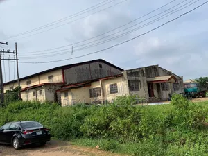 A Land Measuring 2400m2 With an Industrial House for Sales at Adebowale