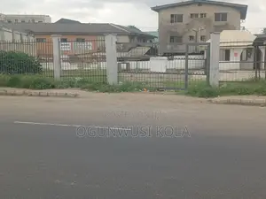Land With Office Near Ikeja Along