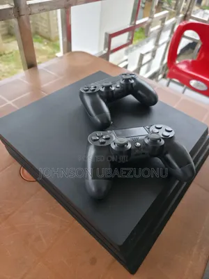 Ps4 Pro With 2 Pads and 4 Games