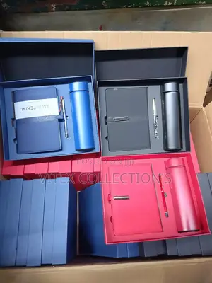 Notebook With Flask And Pen