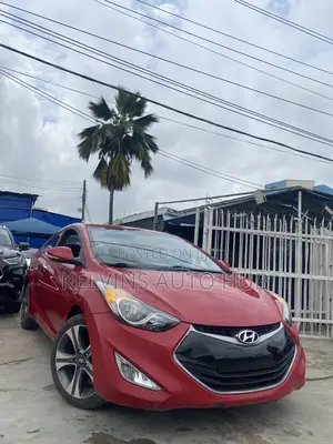 Hyundai Elantra SE Coupe FWD (1.8L 4cyl 6A) 2013 Red