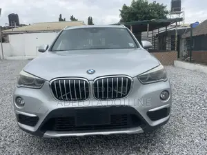 BMW X1 xDrive28i 4dr SUV AWD (2.0L 4cyl Turbo 8A) 2015 Silver