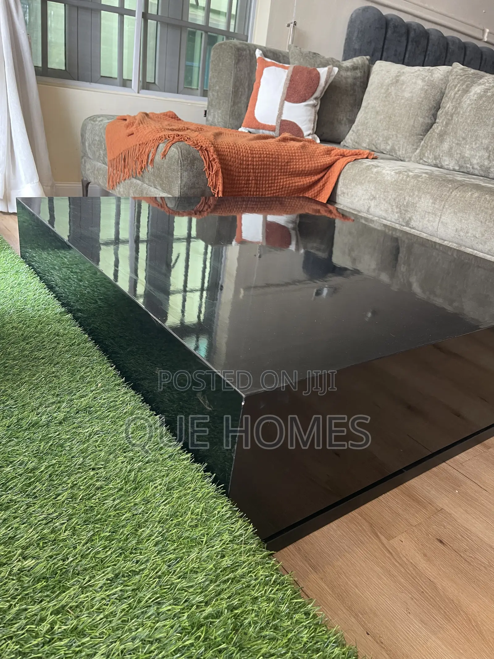 Plain Black Slick Coffee Center Table.