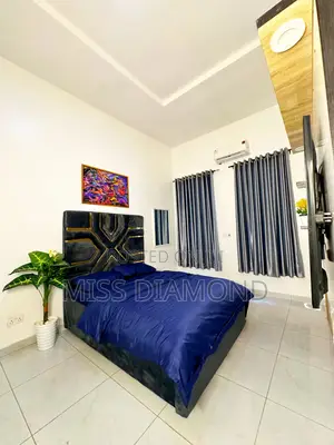 Neatly Used Bed and Bed Frame