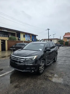 Honda Pilot Touring 4dr SUV 4WD (3.5L 6cyl 9A) 2016 Black