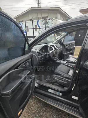 Honda Pilot Touring 4dr SUV 4WD (3.5L 6cyl 9A) 2016 Black