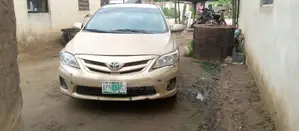 Toyota Corolla LE 4dr Sedan (1.8L 4cyl 4A) 2012 Gold