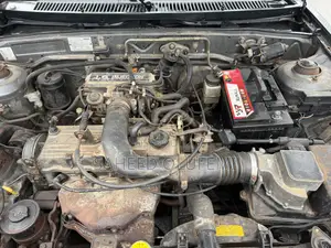 Mazda 323 1999 Gray