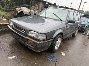 Mazda 323 1999 Gray
