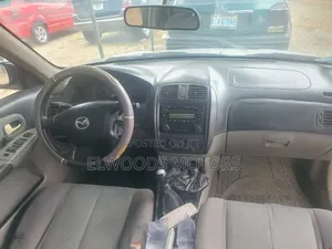Mazda 323 2000 Silver
