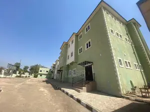 2 Blocks: 500-Seat Hall, Offices, Rooms 6 Two-Bedroom Flats.