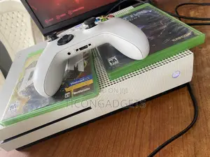 Xbox One S and Pad With Cd 2 Cd Games