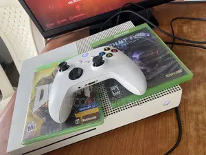 Xbox One S and Pad With Cd 2 Cd Games