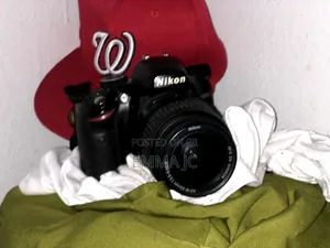 Nikon D3200 With 18-55mm Lens and Battery Charger.
