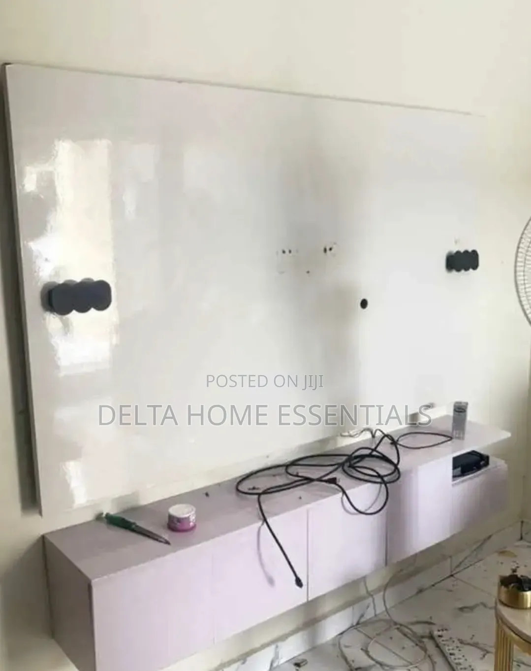 Modern Wall-Mounted TV Console With Backing Panel