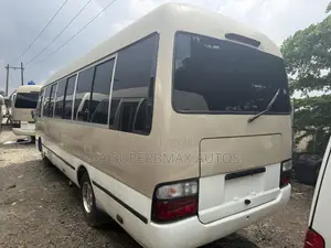 Toyota Coaster 2017 Gold