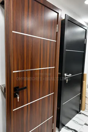 Modern Walnut-Finished Wooden Door With Horizontal Silver Metal Accent