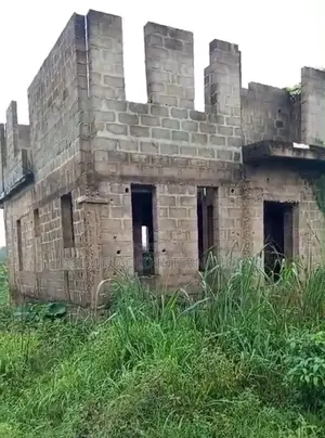 Quater Plot of Land With Building on It