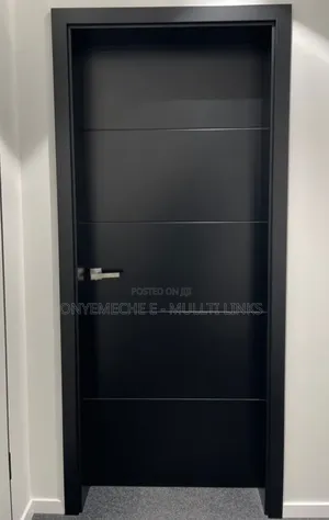 Modern Black Matte Interior Door With a Five Horizontal Groove Panels.