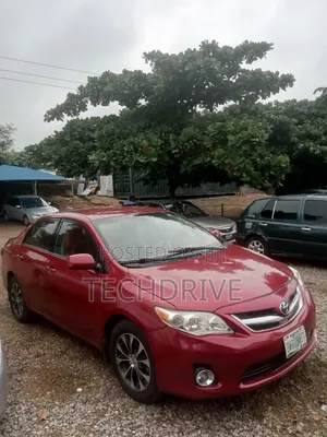 Toyota Corolla LE 4dr Sedan (1.8L 4cyl 4A) 2013 Red