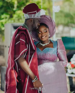 Lilac-Shimmer Iro and Buba Men’S Pinstriped Burgundy Agbada