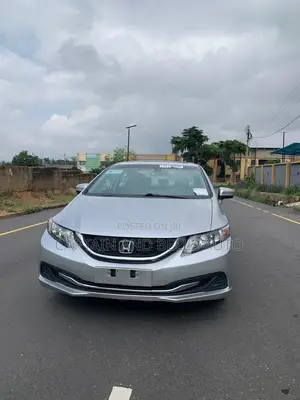 Honda Civic EX-L w/Navigation 4dr Sedan (1.8L 4cyl CVT) 2015 Silver
