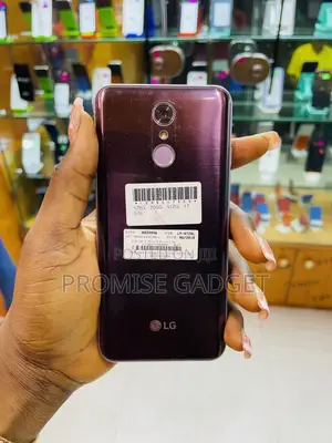 LG Q7 32 GB Red