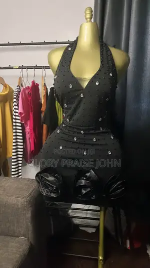 Ruffle Mini Bodycon Dress With a Bow Neckline