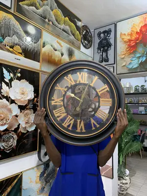 Luxury Moving Wheel Wall Clock – Timeless