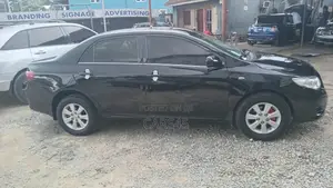 Toyota Corolla Base 4dr Sedan (1.8L 4cyl 5M) 2010 Black