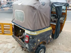 Bajaj RE 2021 Yellow
