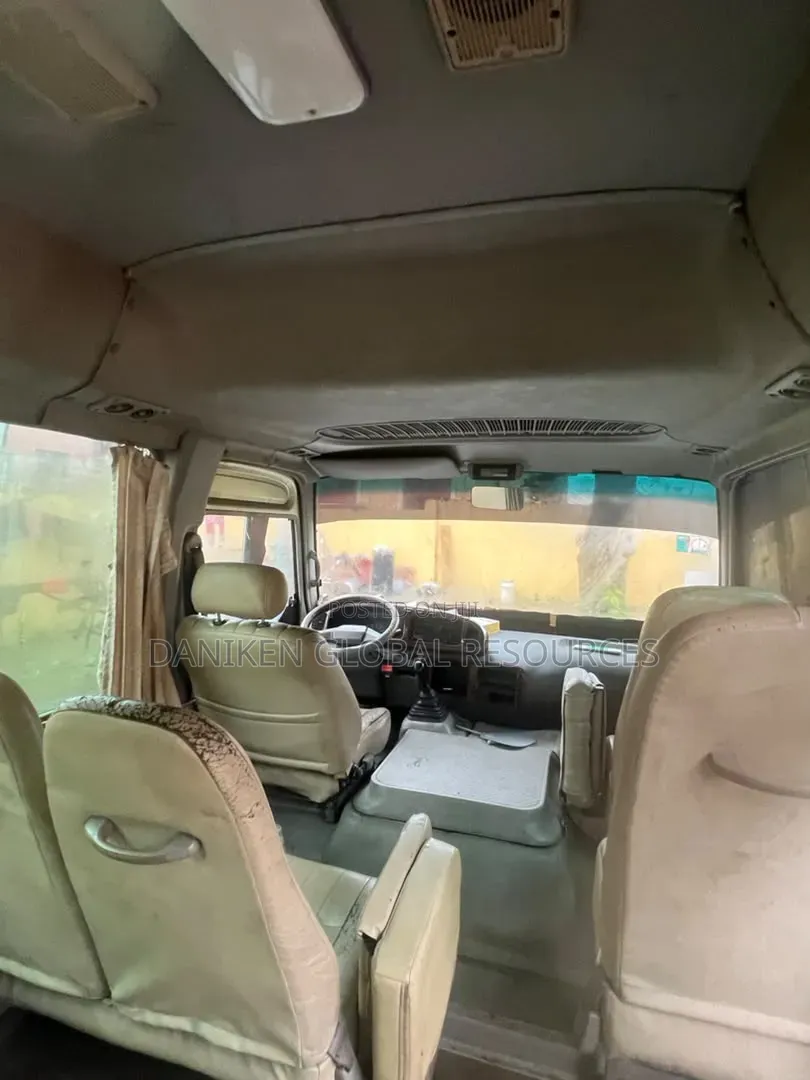 Toyota Coaster 2013 Brown