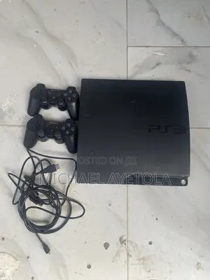 PlayStation3 With 7 Games and Two Controller Power Cord