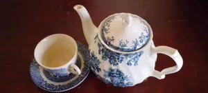 Teapot With Cup and Saucer