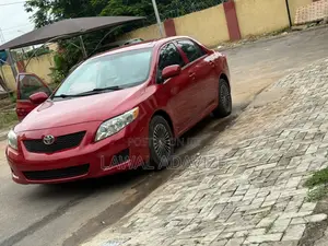 Toyota Corolla LE 4dr Sedan (1.8L 4cyl 4A) 2010 Red